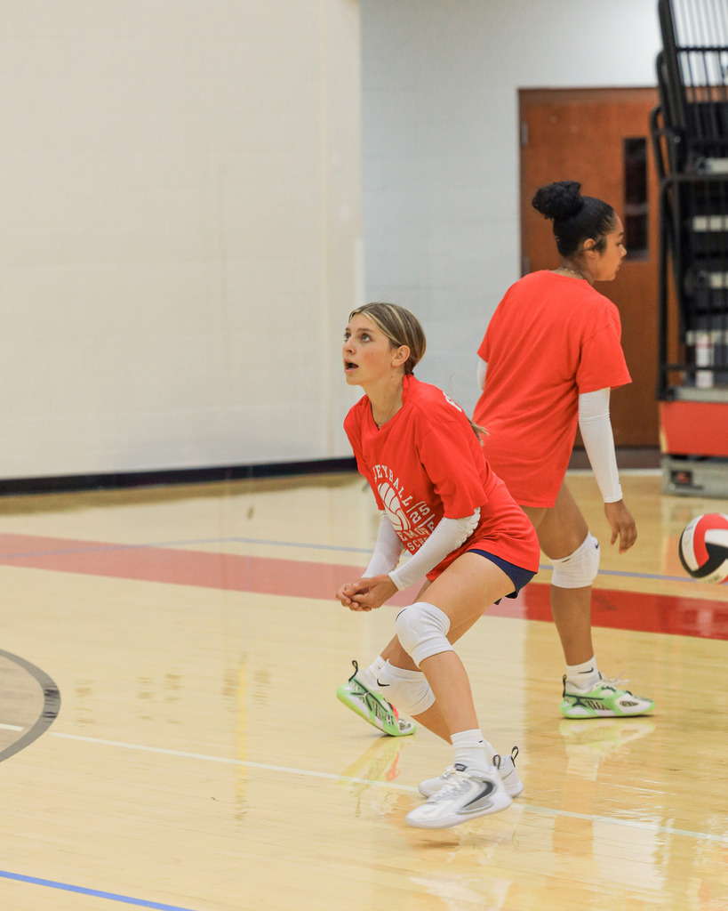 Volleyball Campers working on drills and learning new skills.