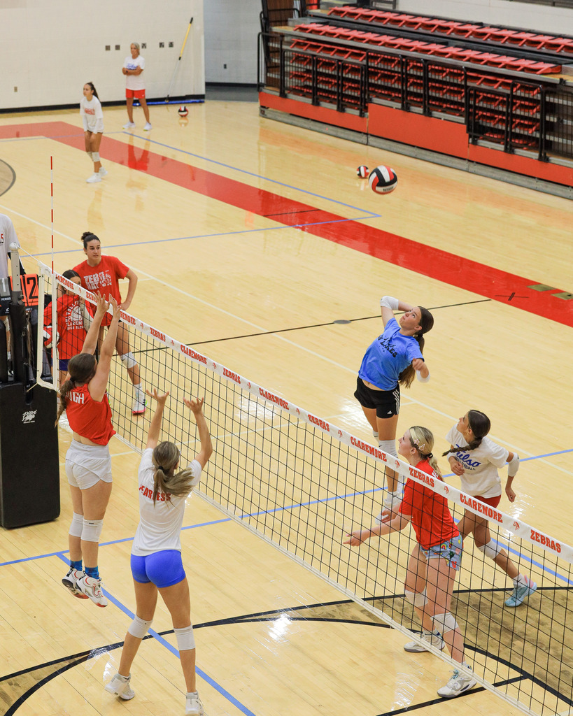 Volleyball Campers working on drills and learning new skills.