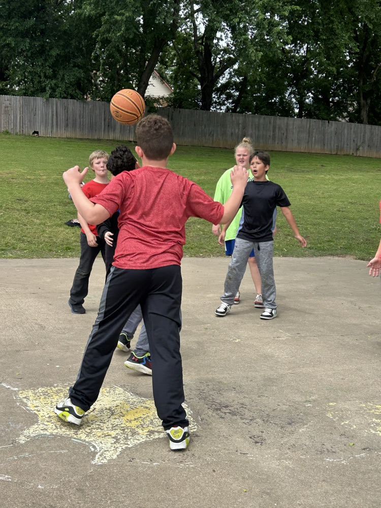 students playing basketball 