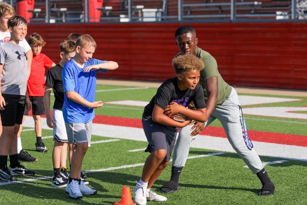 Zebra football players recently suited up and stepped onto the field of community impact, spending time at a youth football camp and investing in the next generation of athletes.  Throughout the camp, our athletes truly coached up the next play—breaking down skills, demonstrating techniques, and calling out encouragement like true leaders on and off the field. They were all-in from kickoff to the final whistle, making sure every young player had a chance to learn, grow, and gain confidence.  It was a great opportunity for our players to move the chains in the community, build relationships, and tackle the role of mentorship head-on. By sharing their knowledge and energy, they helped run up the score in positivity and inspired future Zebras to keep pushing forward.