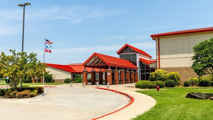 Flag poles in front of school