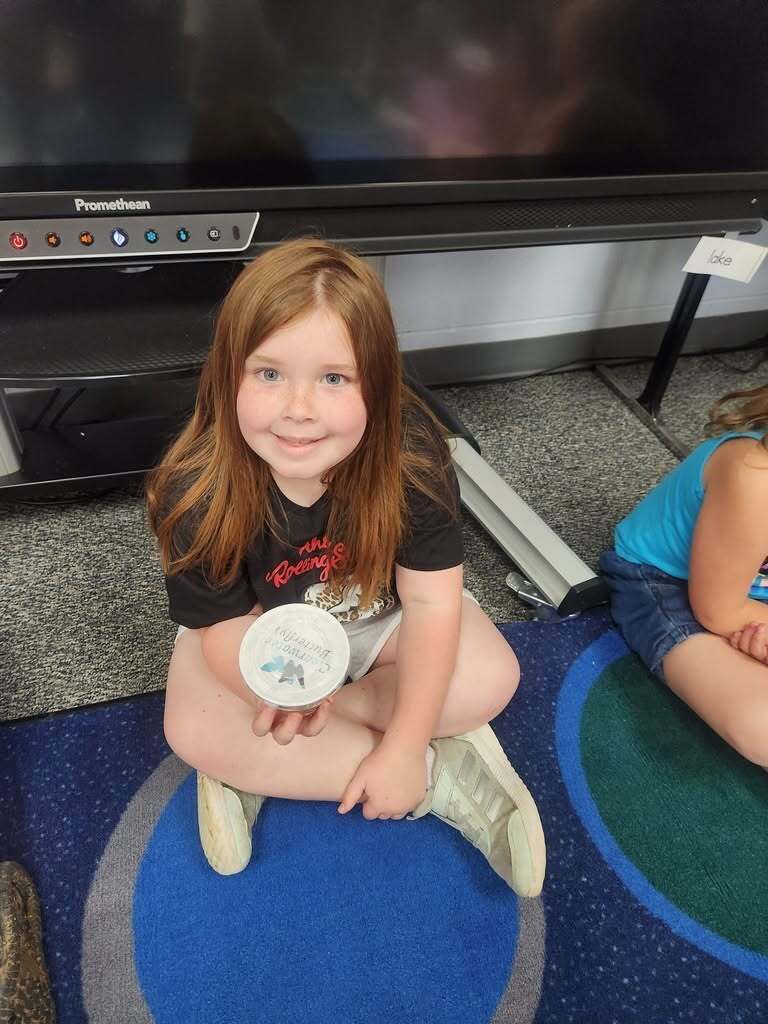 Elementary students learning about the butterfly life cycles.