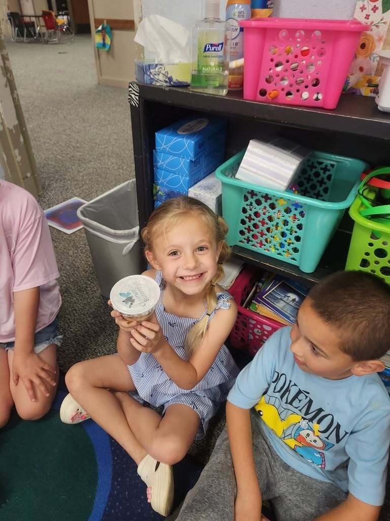 Elementary students learning about the butterfly life cycles.
