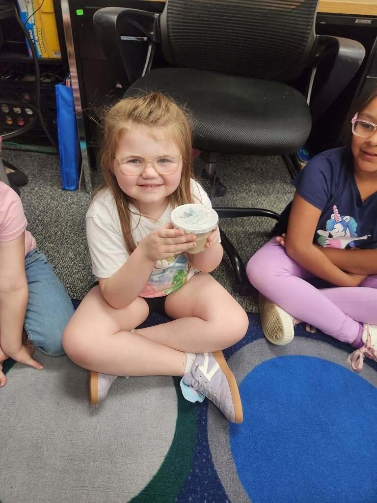 Elementary students learning about the butterfly life cycles.