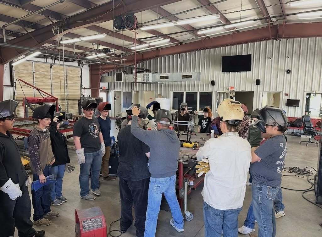 Mr. Boyer teaching a welding lesson.