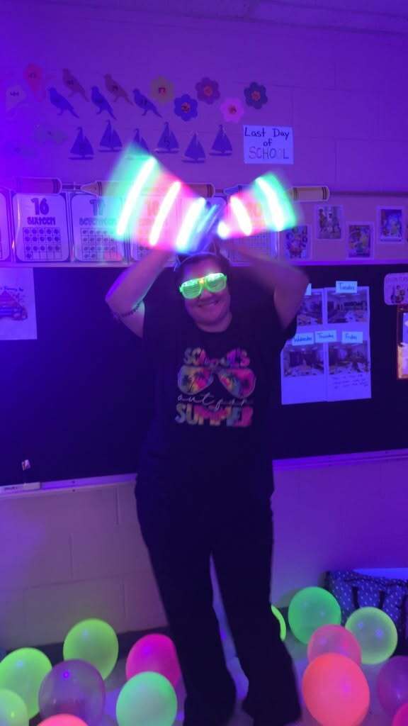 Elementary students celebrating the last day of school with a glow party
