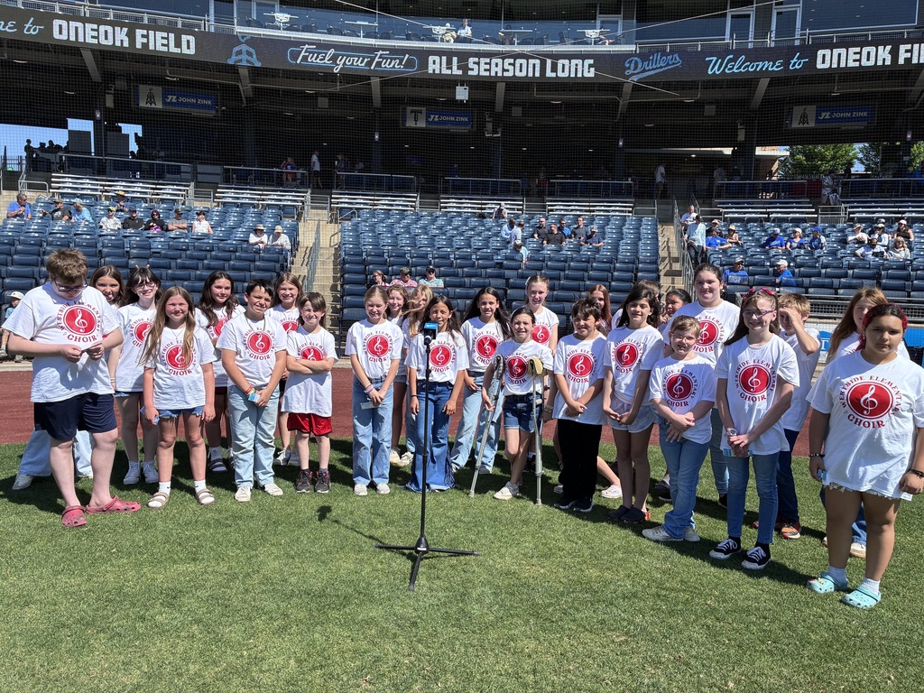 Westside Honor Choir singing the national anthem at the Drillers game.