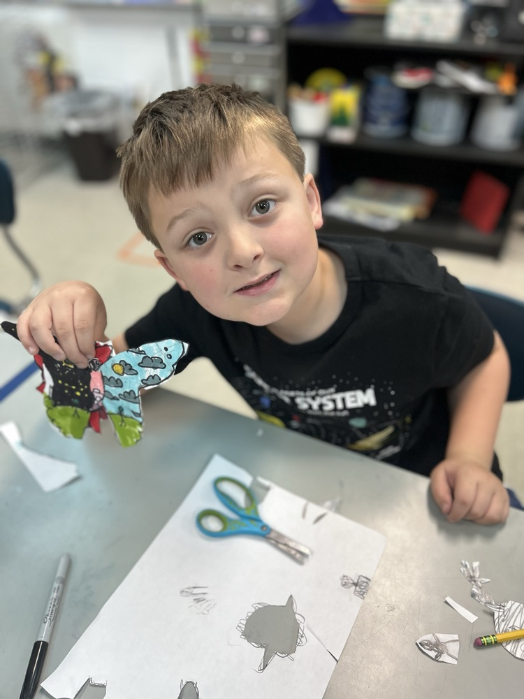Student with his butterfly.