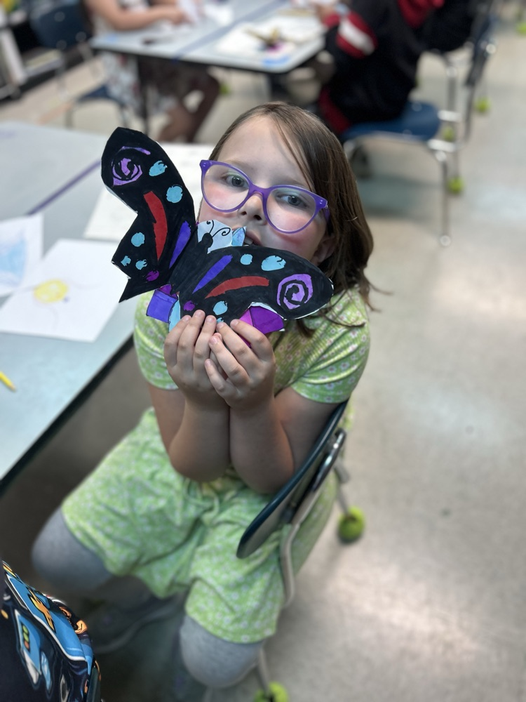 Student with her colorful butterfly