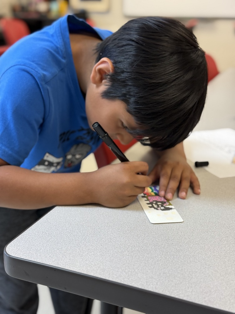 Student working hard on their bookmark