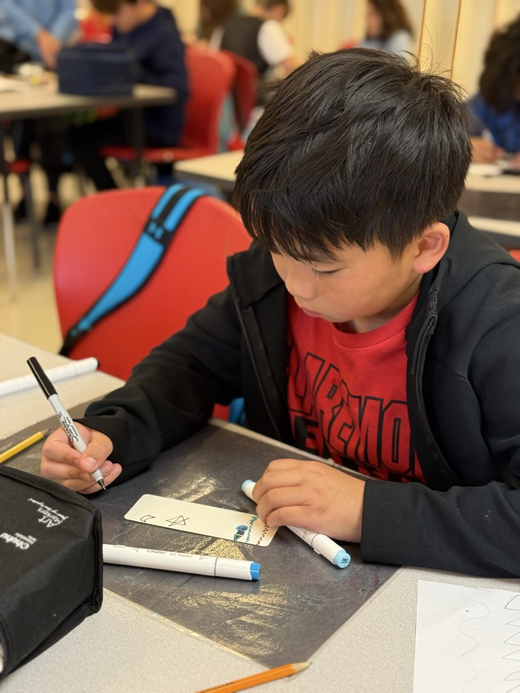 Student working on their bookmark