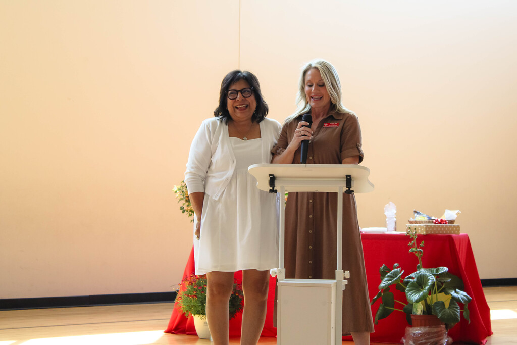 debi Goodwin smiling with principal