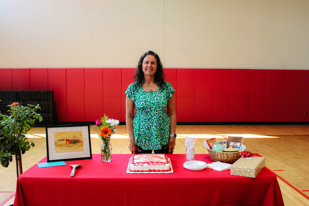 lora siever smiling with her cake