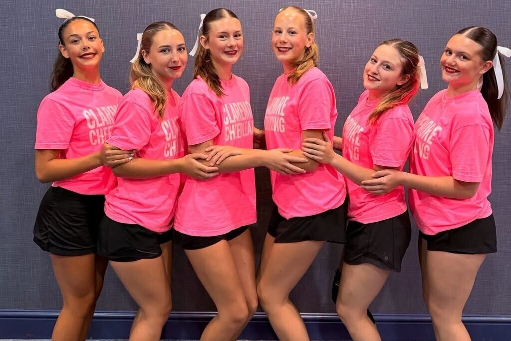 Claremore High School cheer team at camp.