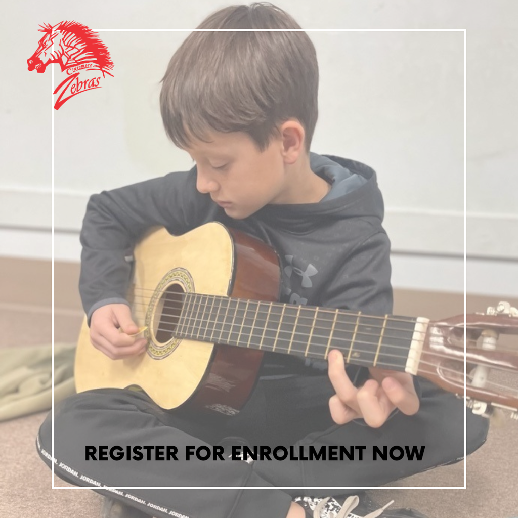 student playing guitar