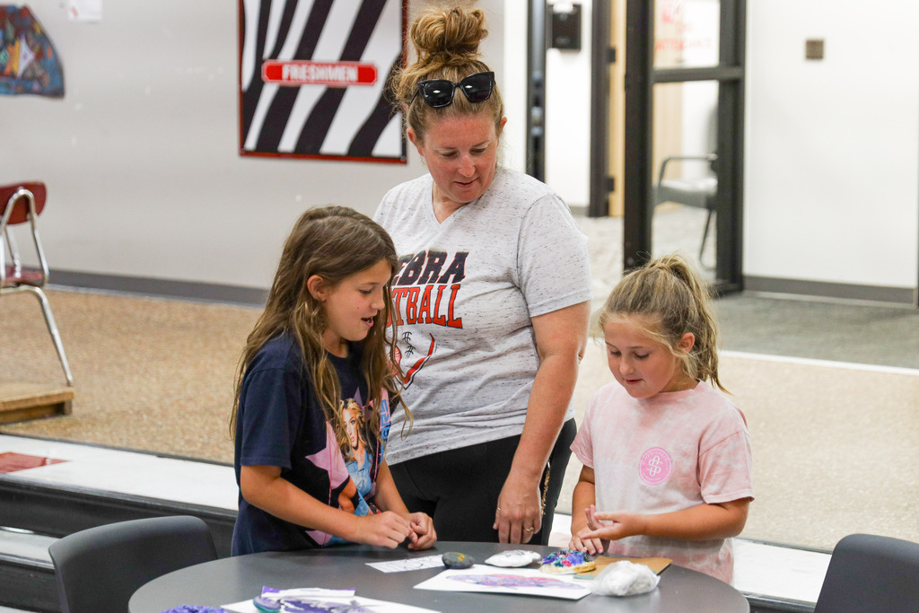 Parents at art camp showcase.