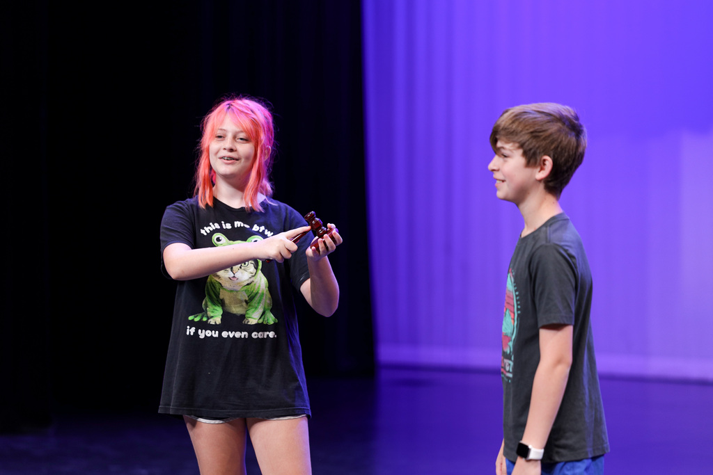 Junior high students performing at theater camp