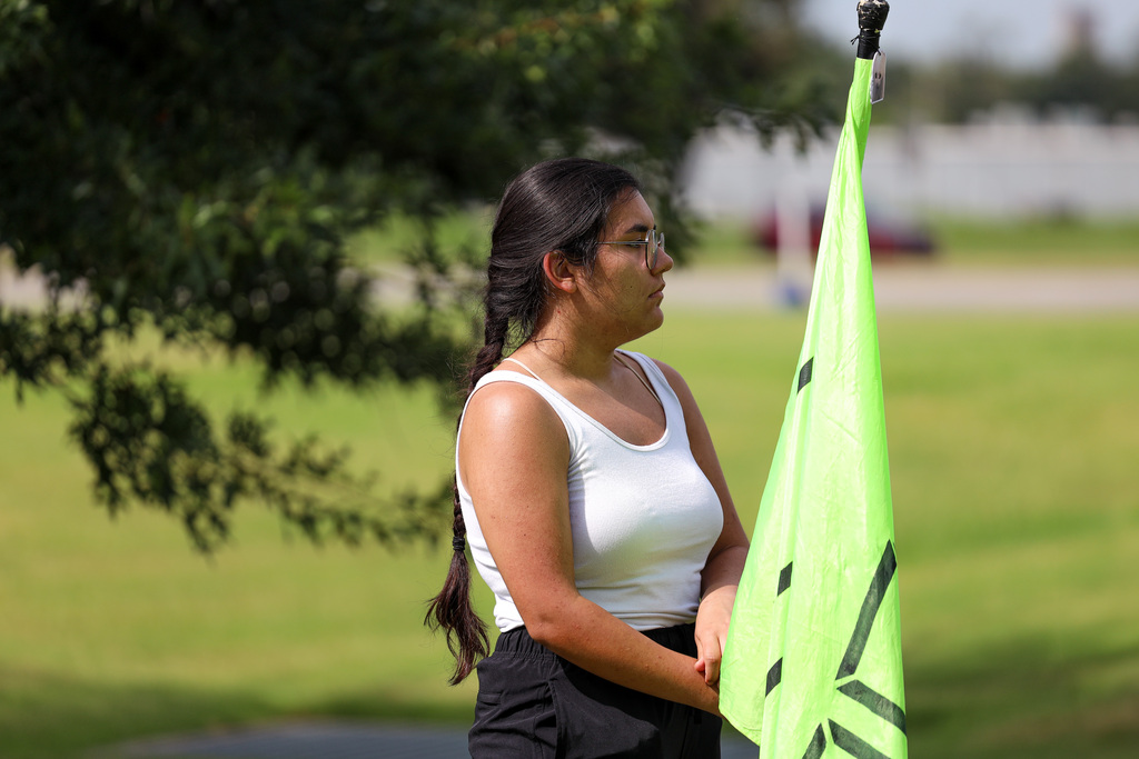 Color Guard practicing outside.