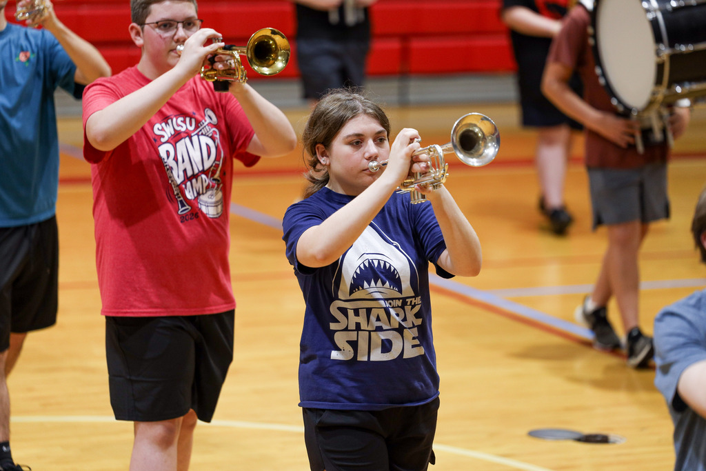 Band members learning their marches.