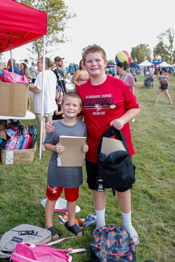 2 students with their new backpacks