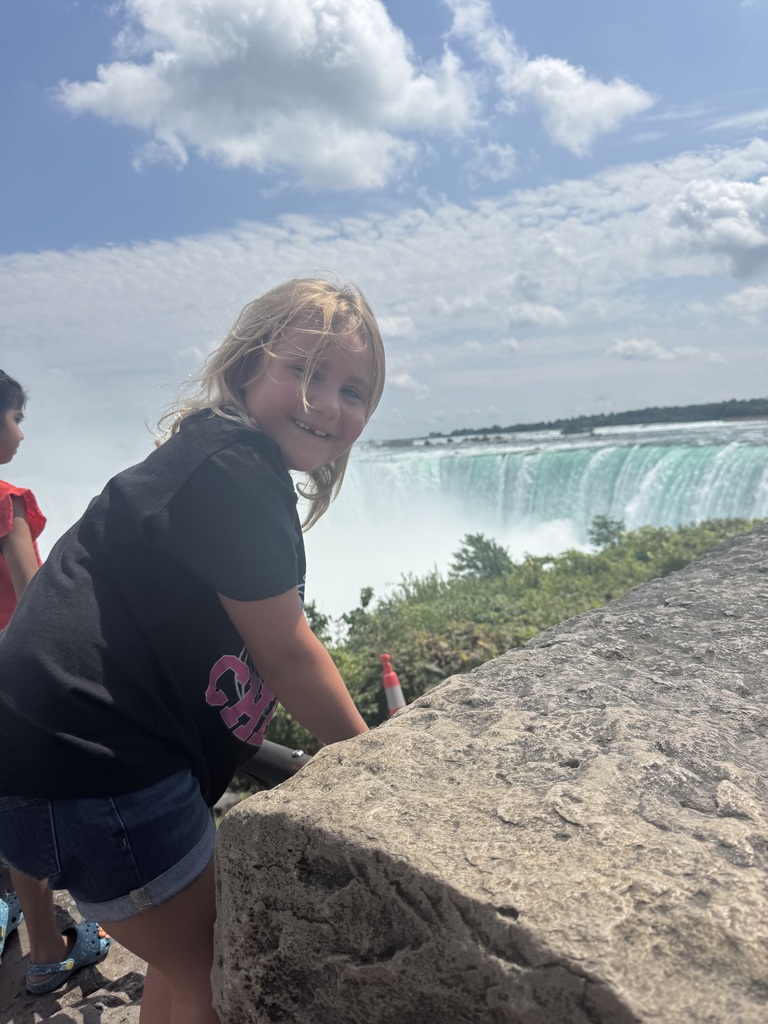 Girl looking at Niagara Falls