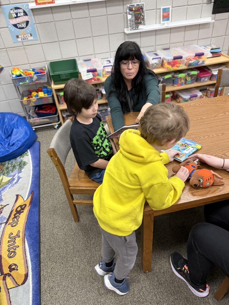 students and staff reading