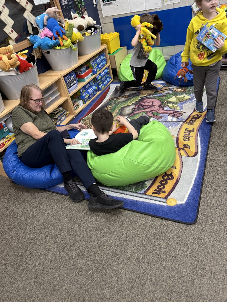 students and staff reading