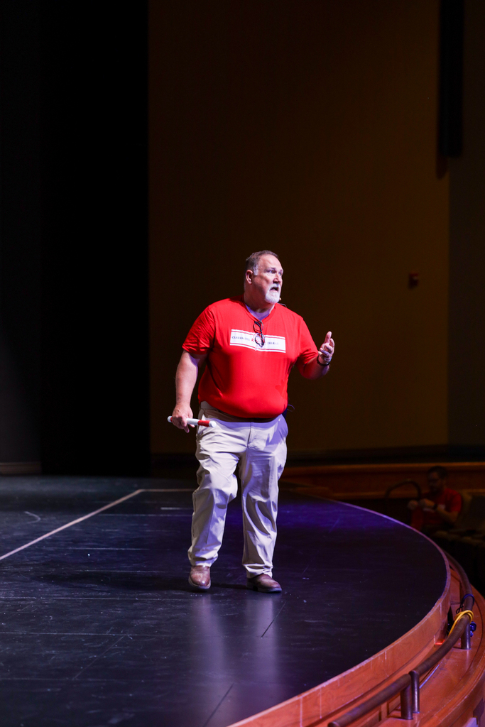 Brain Frazier giving away the spirit stick