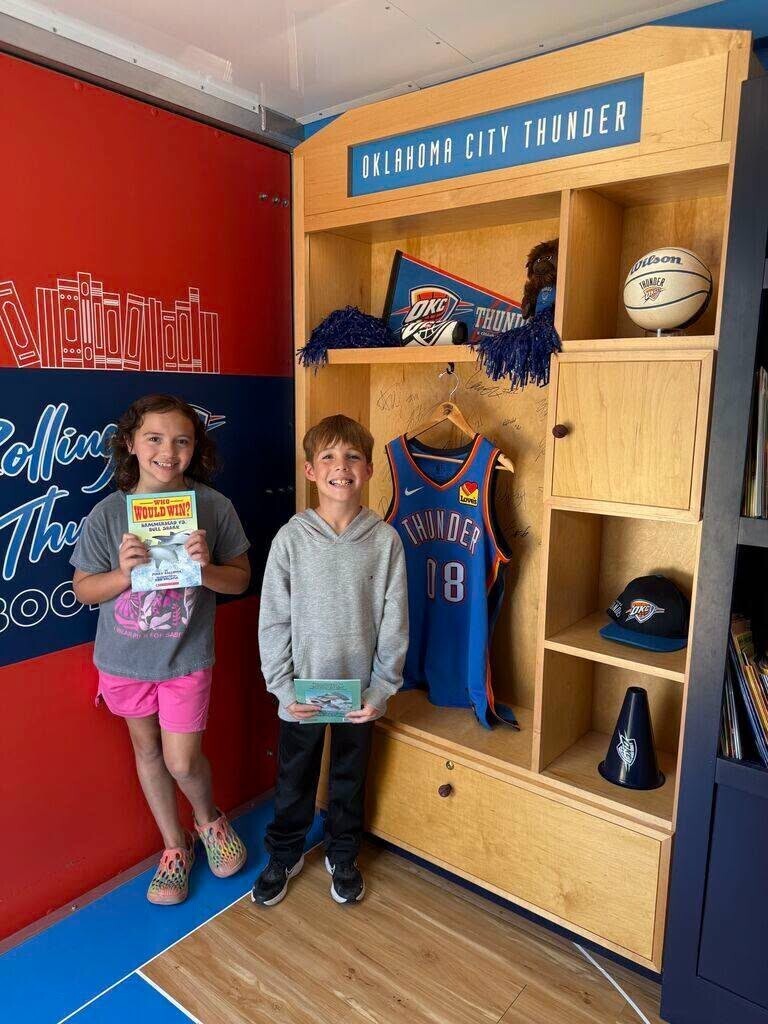 Claremont students with the rolling thunder book bus