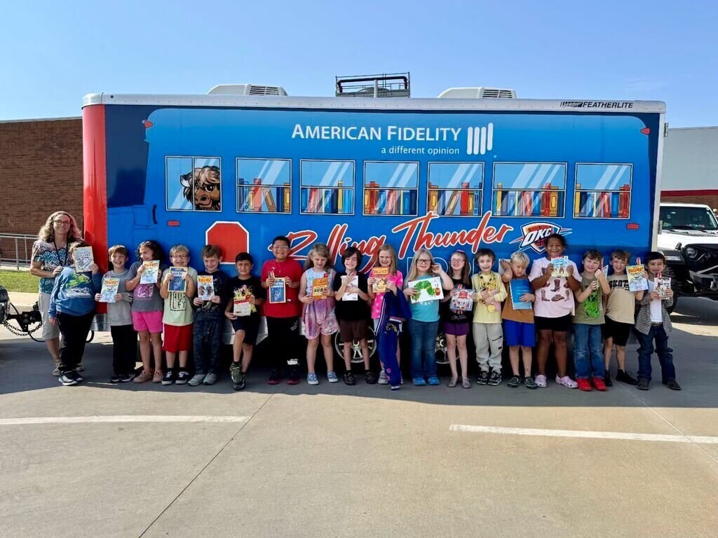 Claremont students with the rolling thunder book bus