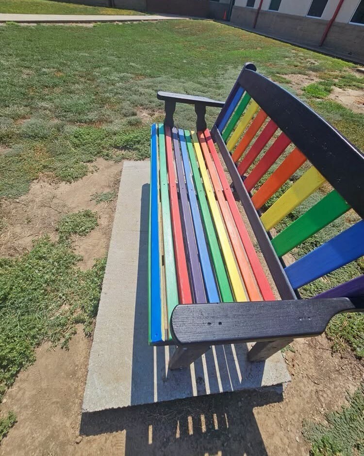 Catalayah parents and students repainting the sidewalks.