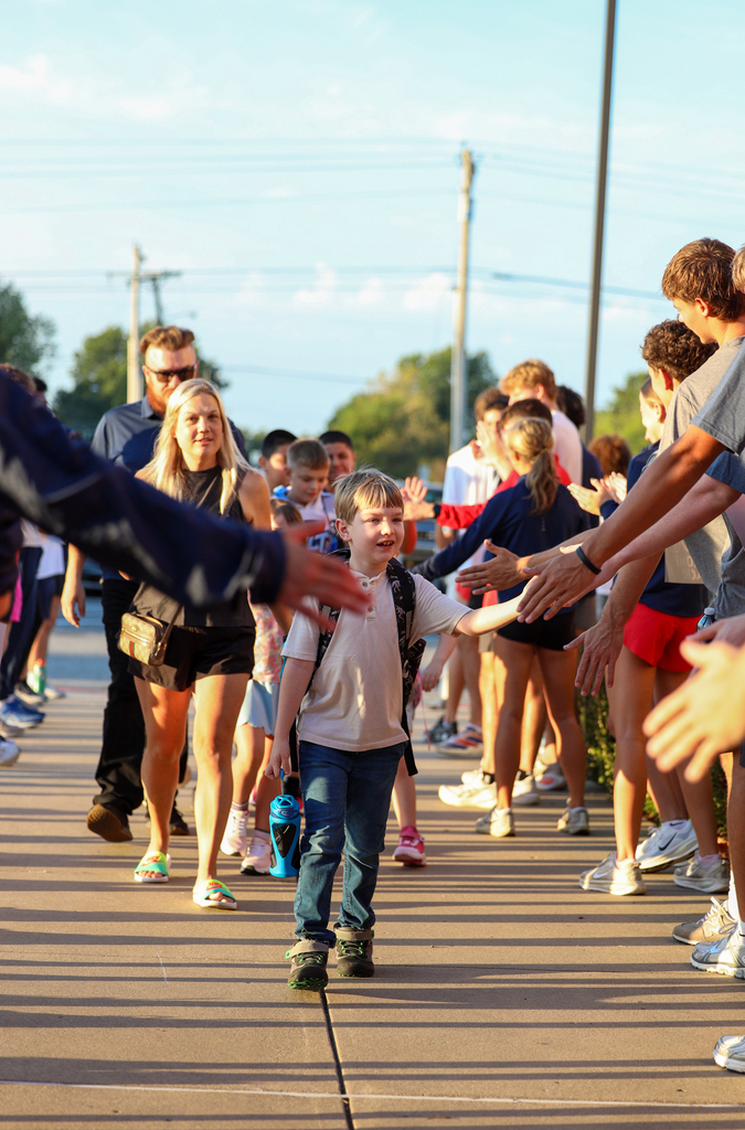 elementary  kids walking in