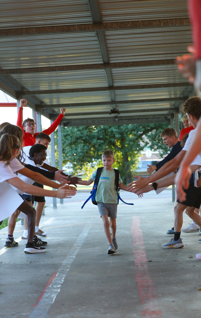 elementary  kids walking in