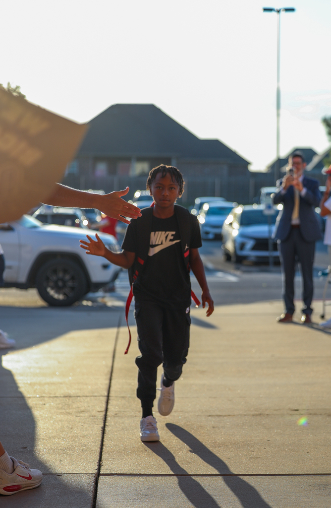elementary  kids walking in