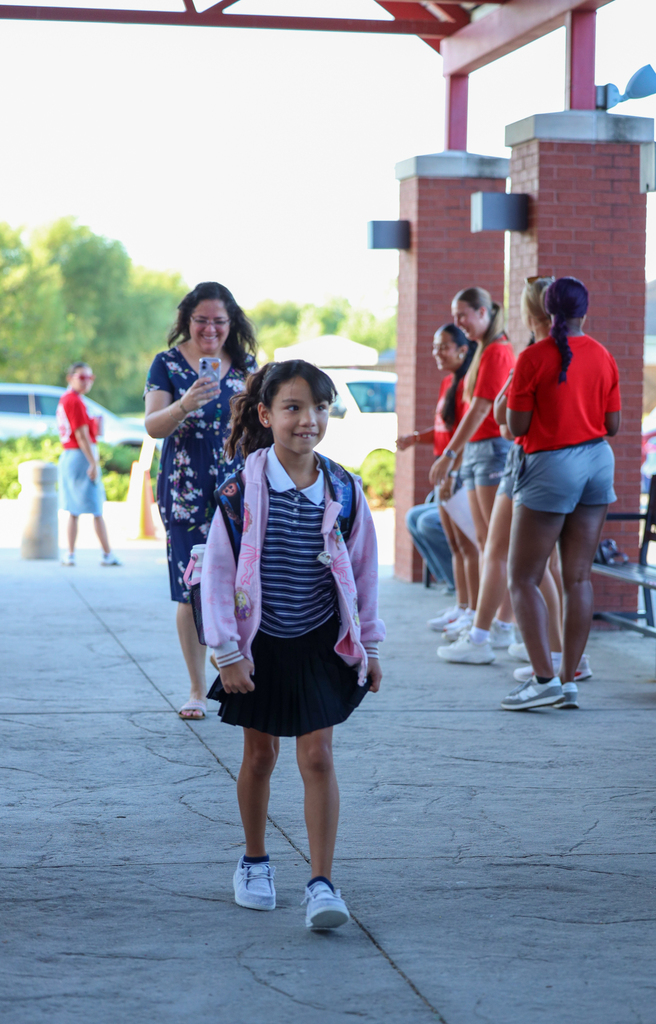 elementary  kids walking in