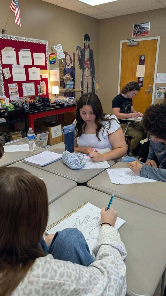 What happens when students stop settling for “good enough” words? They get creative. In Mrs. Andrews's Creative Writing class at CHS, students are sharpening their word choice through hands-on activities: decorating hands with powerful verbs and using tiny 1-inch-by-1-inch frames to zoom in on the world around them. The challenge? Look closely. Notice the minute details. Choose precise, vivid words that bring those details to lifebecause powerful writing starts with powerful words.