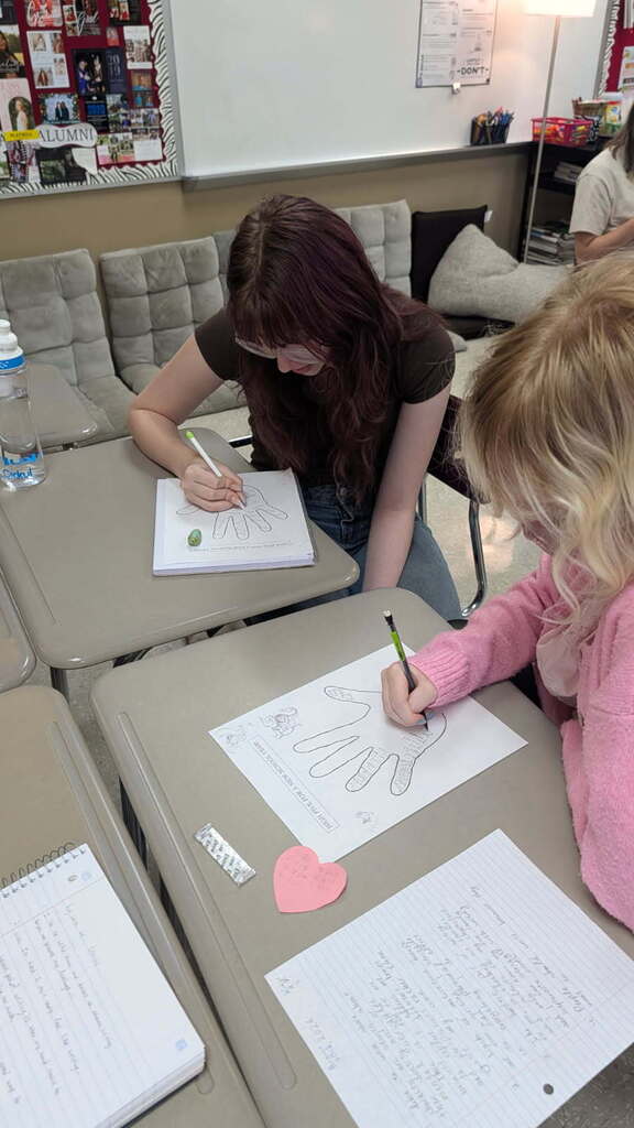 What happens when students stop settling for “good enough” words? They get creative. In Mrs. Andrews's Creative Writing class at CHS, students are sharpening their word choice through hands-on activities: decorating hands with powerful verbs and using tiny 1-inch-by-1-inch frames to zoom in on the world around them. The challenge? Look closely. Notice the minute details. Choose precise, vivid words that bring those details to lifebecause powerful writing starts with powerful words.