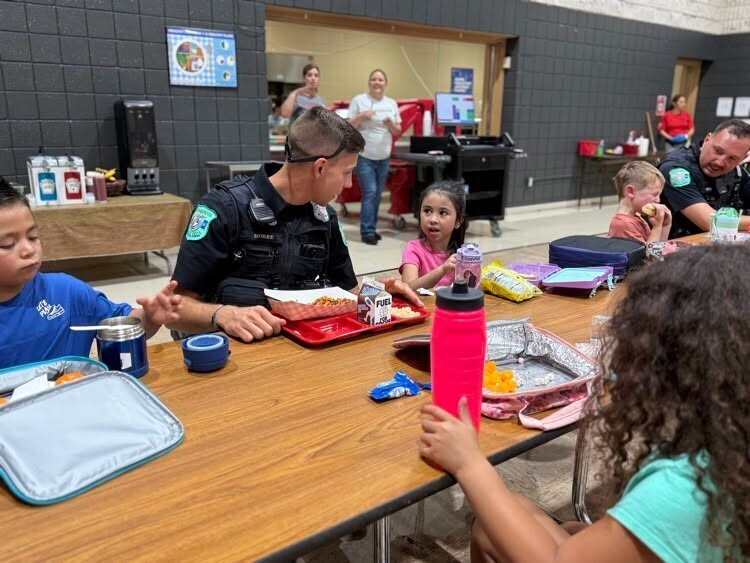 SRO officers having lunch with Claremont students.