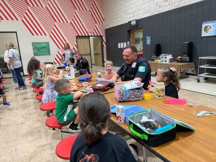 SRO officers having lunch with Claremont students.
