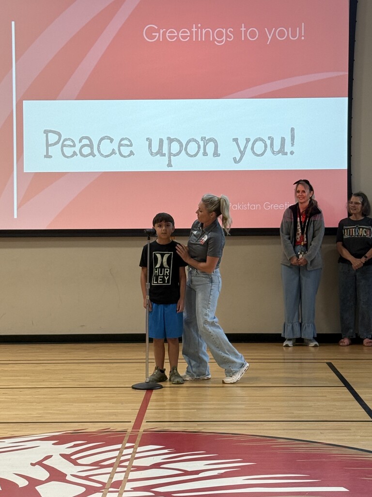 3 staff members and a student talking into the mic 