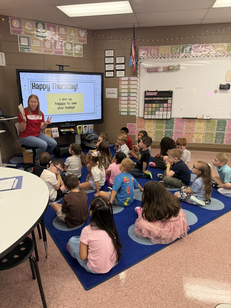 Mrs Armbristwr reading to class