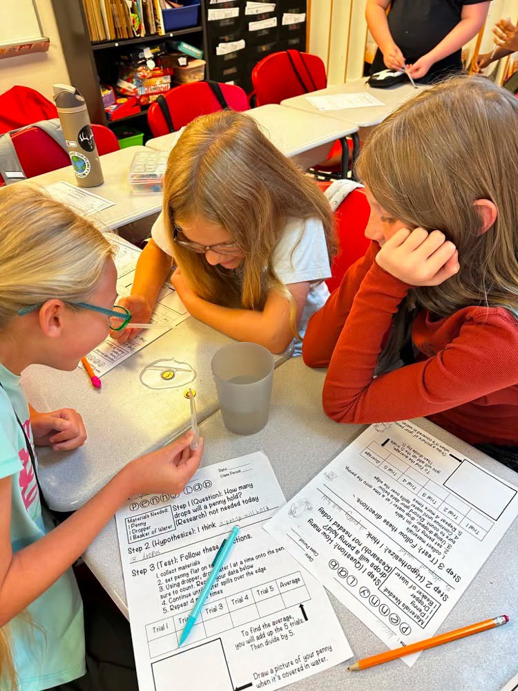 Students doing experiments with pennies