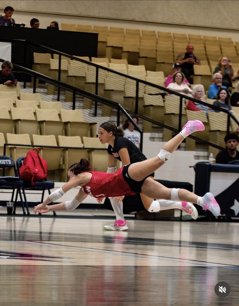 Taylor Garrison diving for a ball