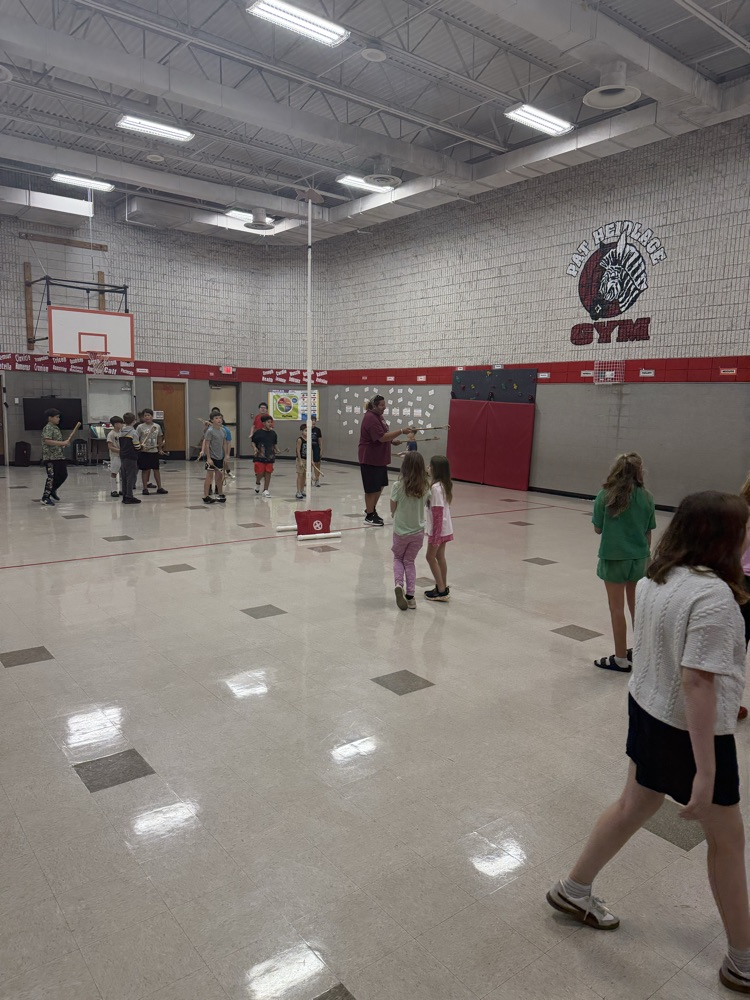 photo of students playing stick bal