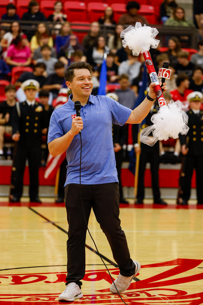 News on 6 reporter with Spirit Stick