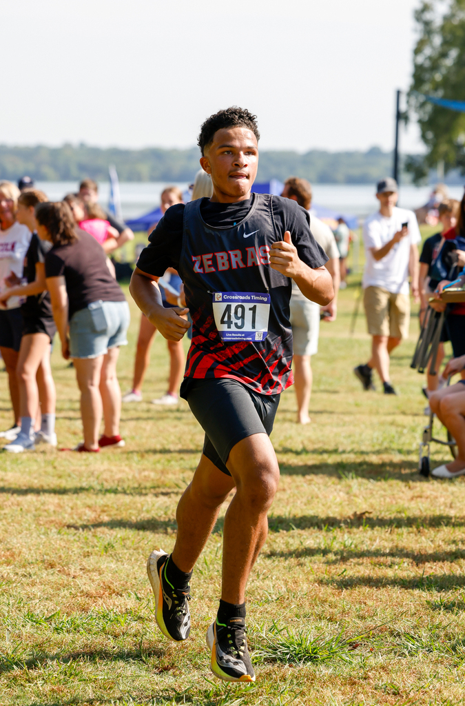 cross country runner running the race