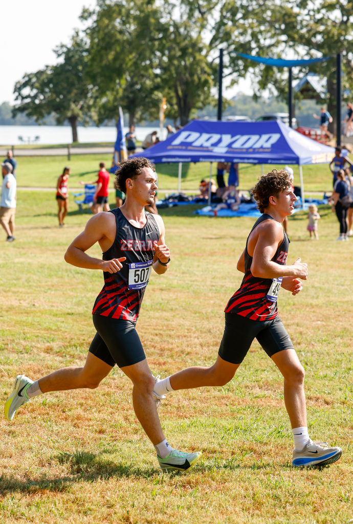 cross country runners running the race