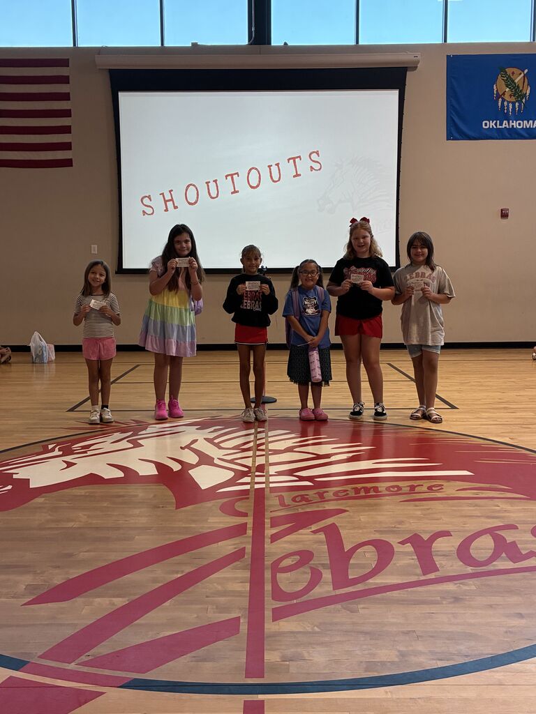 Six students smiling for shoutouts
