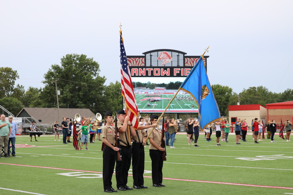 NJROTC Cadets holding flags
