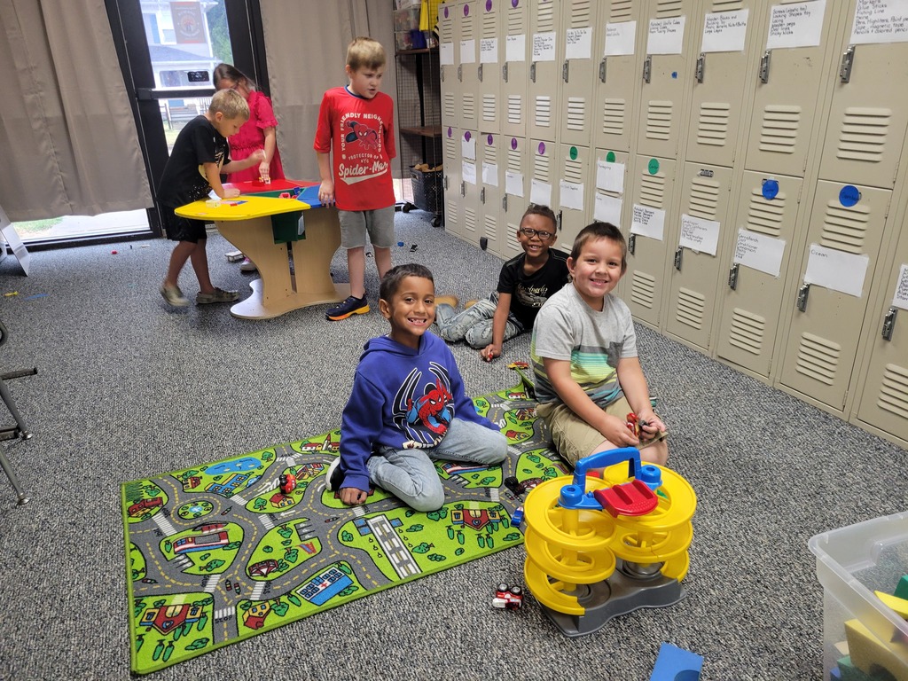Six kids playing indoors